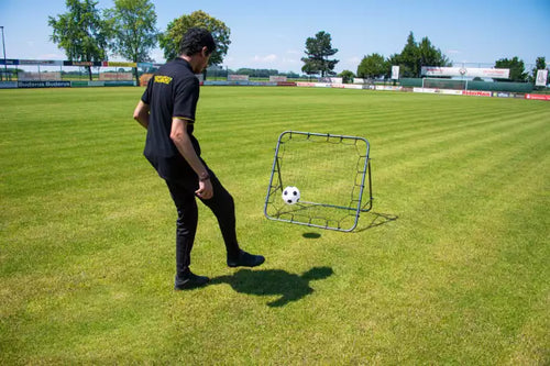 Rebounder set with inflatable ball