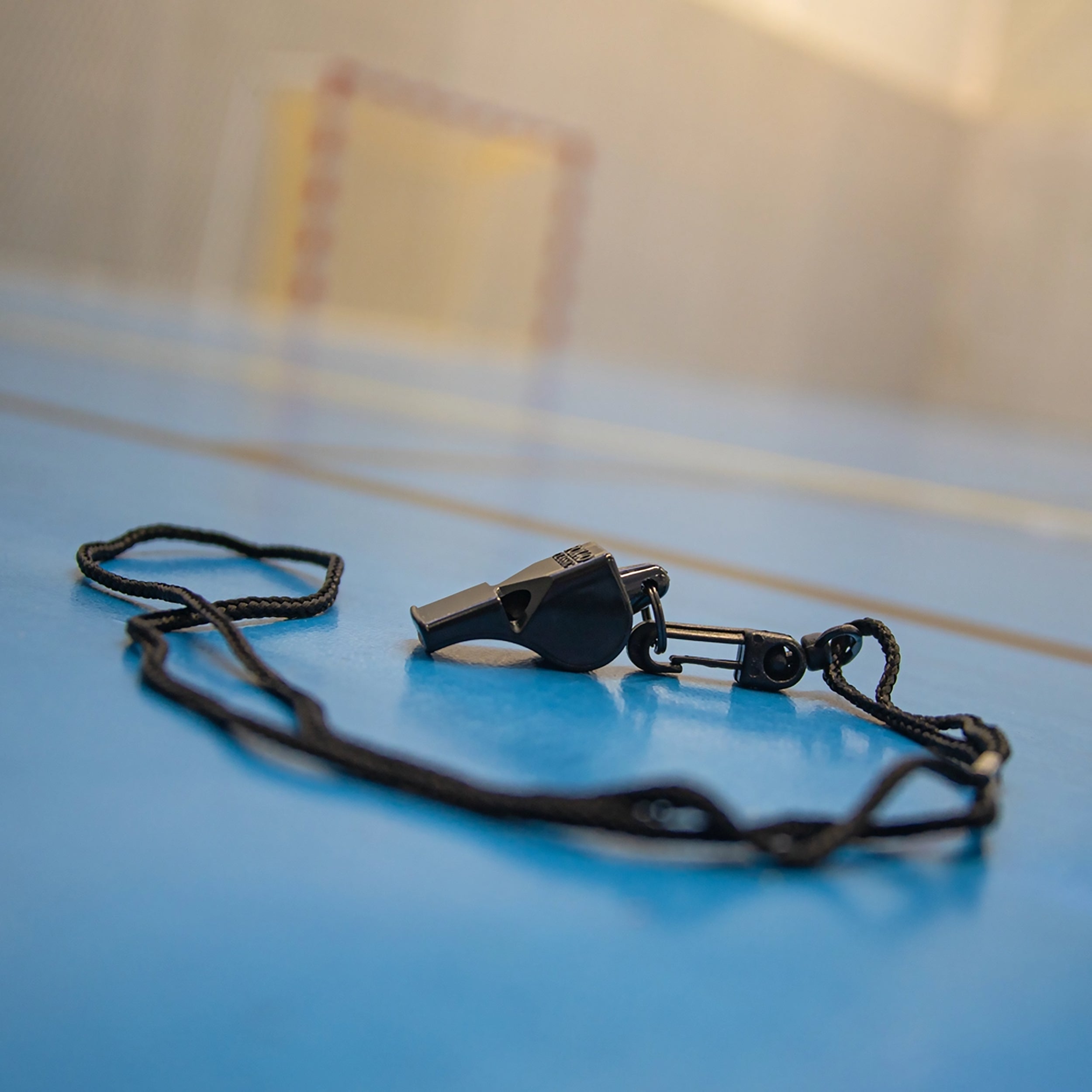 Referee whistle with lanyard