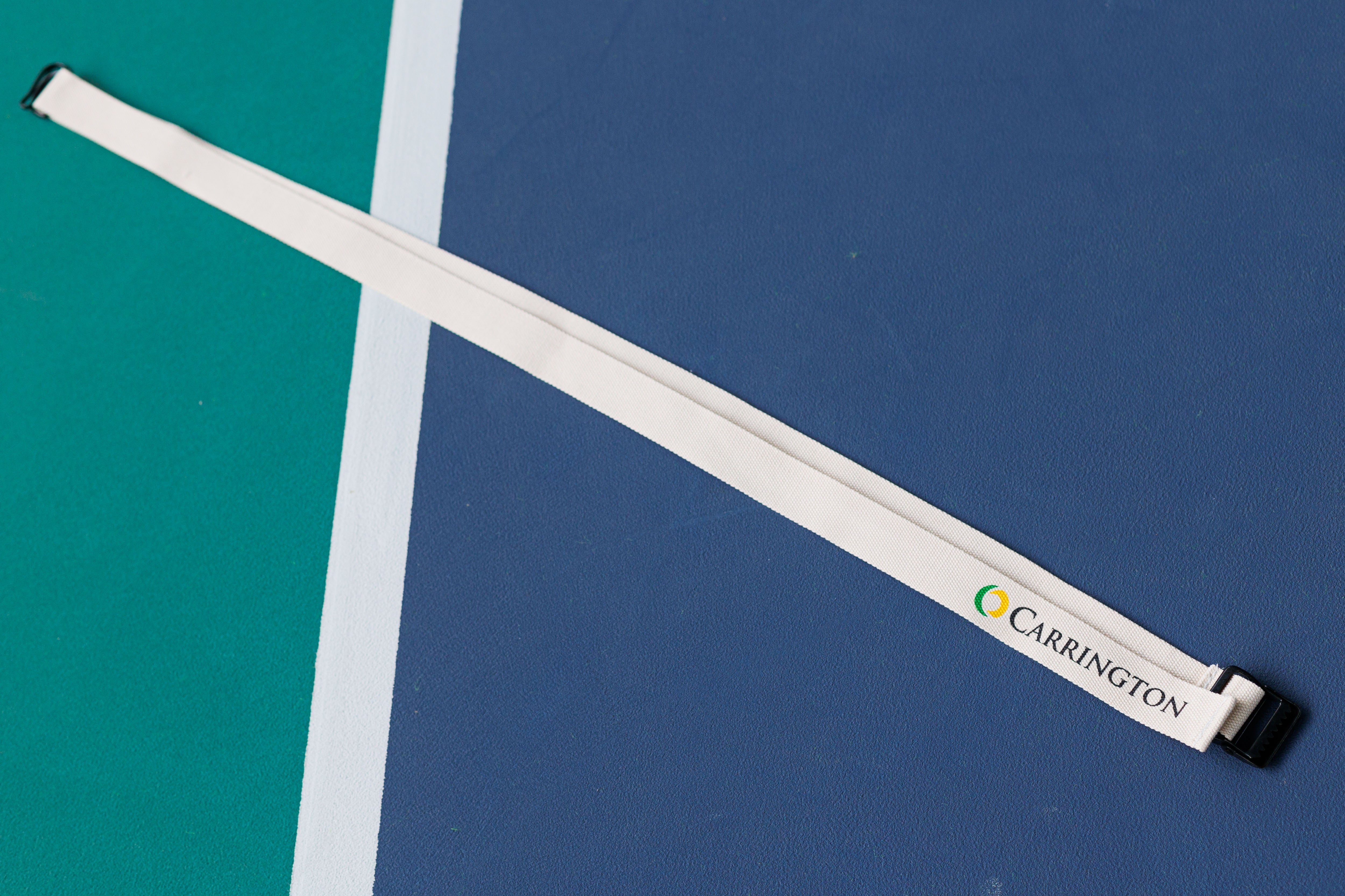 Cotton tennis net regulator for clay courts
