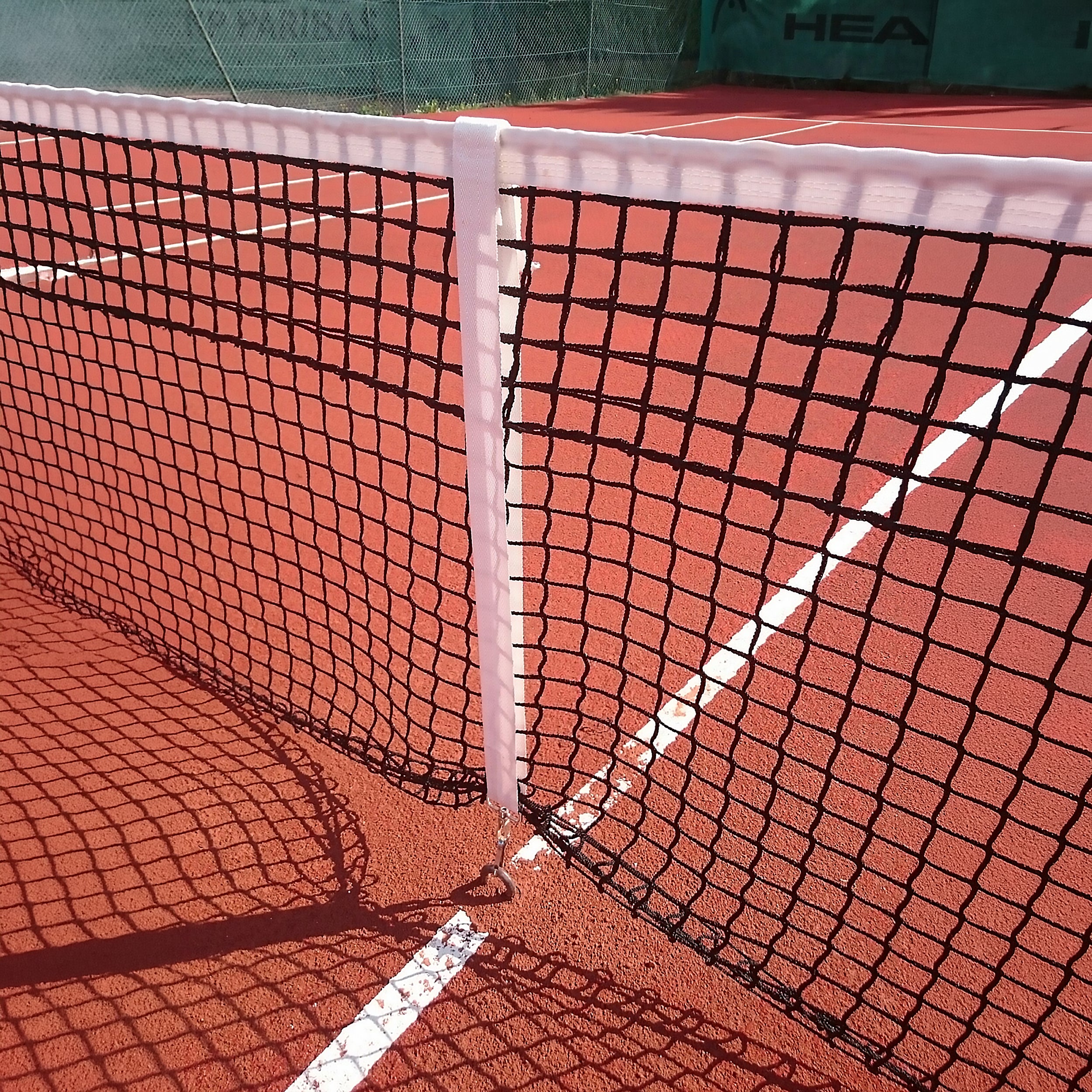 Centre strap for tennis net